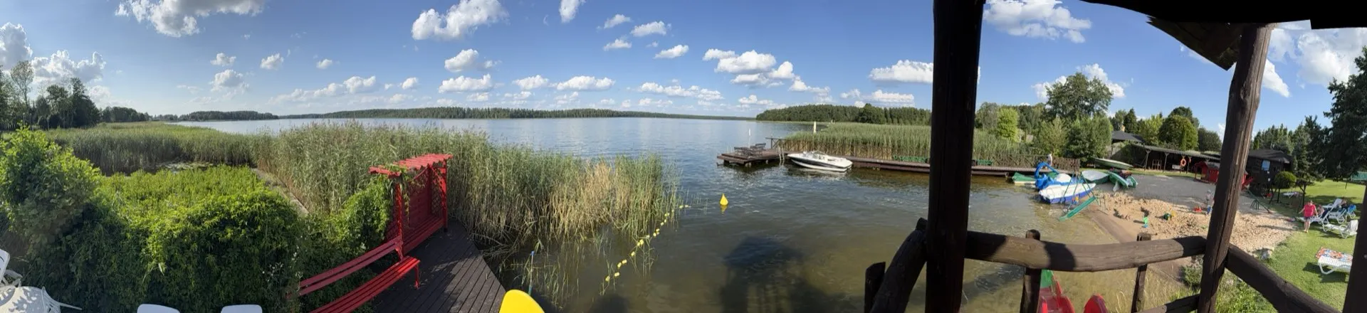 Panorama jeziora Necko — pomost, motorówka, kajak, plaża VITA Augustów